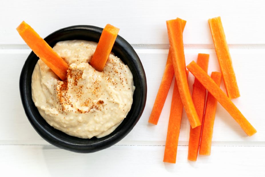 Healthy snacks to keep you full on the move carrots and houmous